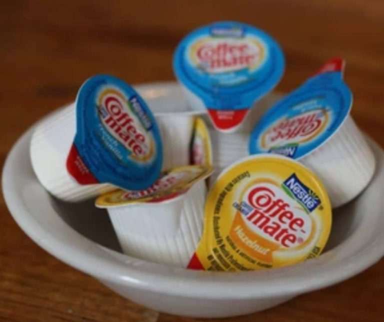 Where is the expiration date located on coffee mate creamer