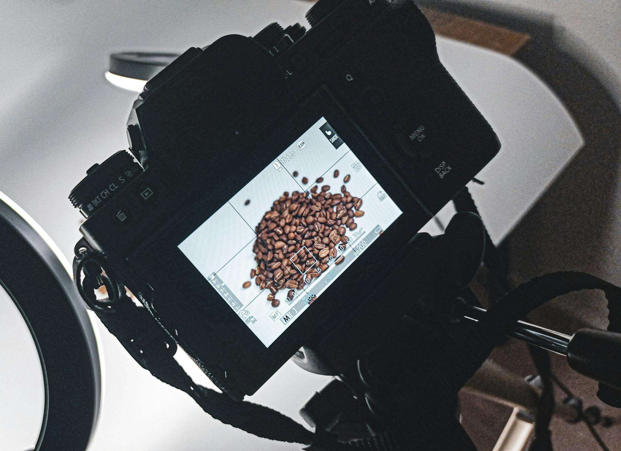 Black Dslr Camera Showing Pink and Yellow Beads